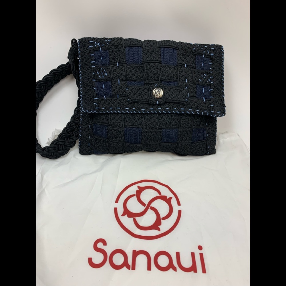 Sanaui crocheted bag  Comes with Dust bag.
